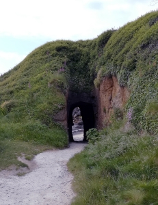 Arch under cliff
